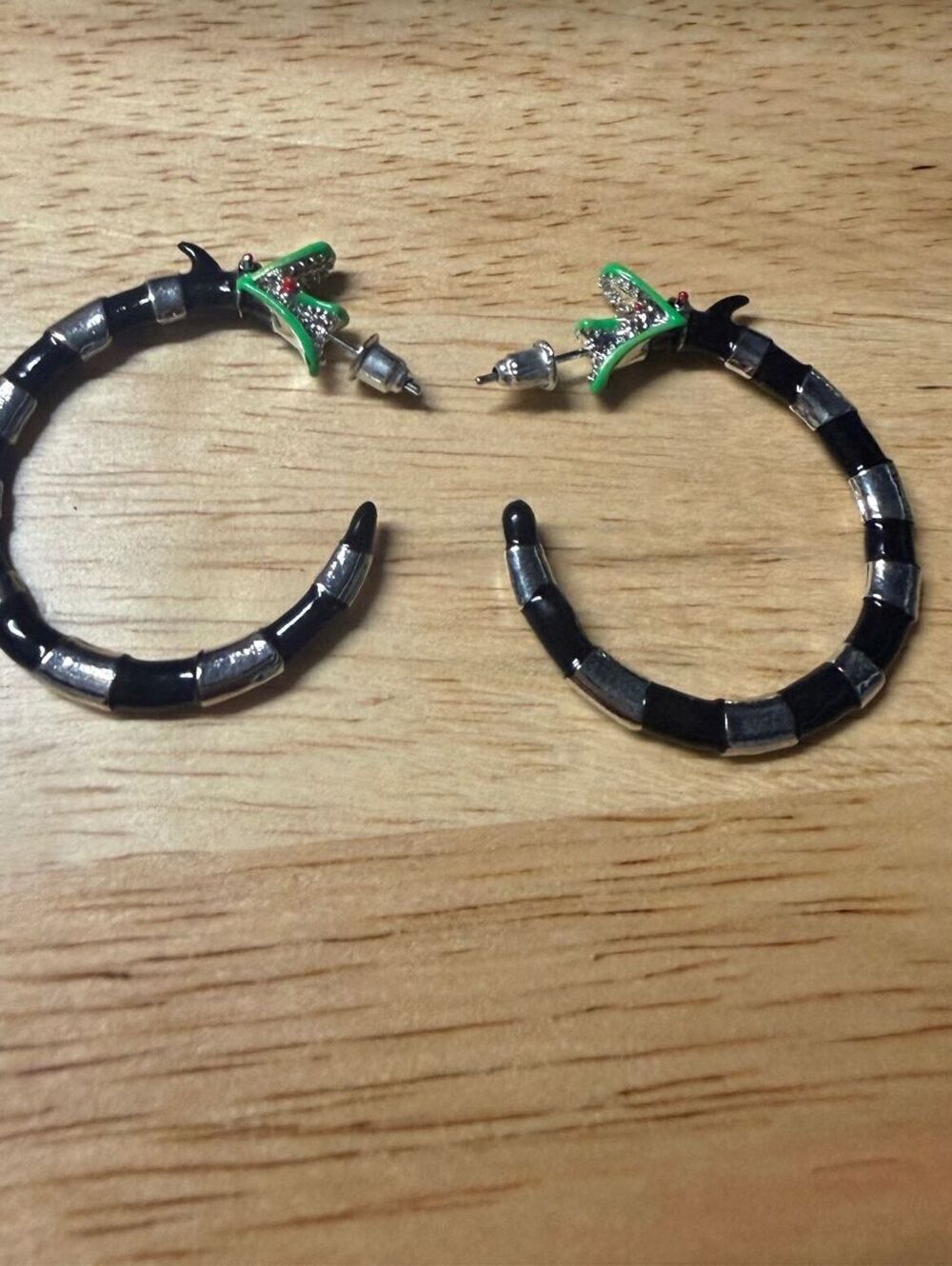 Stylish Black and Silver Hoop Earrings with Green Accent